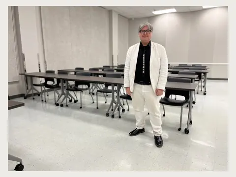 Herbert Midgley in a university classroom.