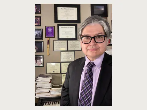Herbert Midgley in his university office.