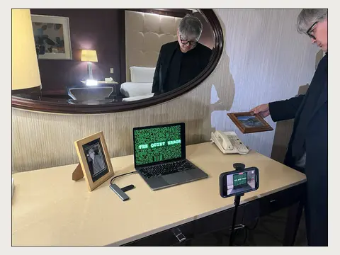 Herbert Midgley working with the computer display used in The Quiet Error.