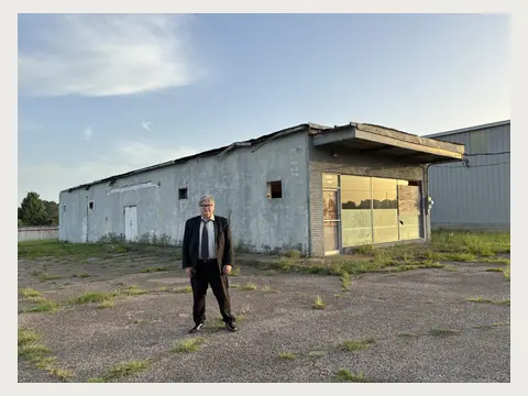 Herbert Midgley scouting an industrial location for a film.