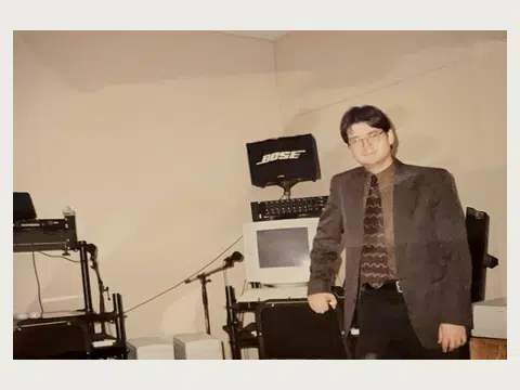 A younger Herbert Midgley in a music studio.