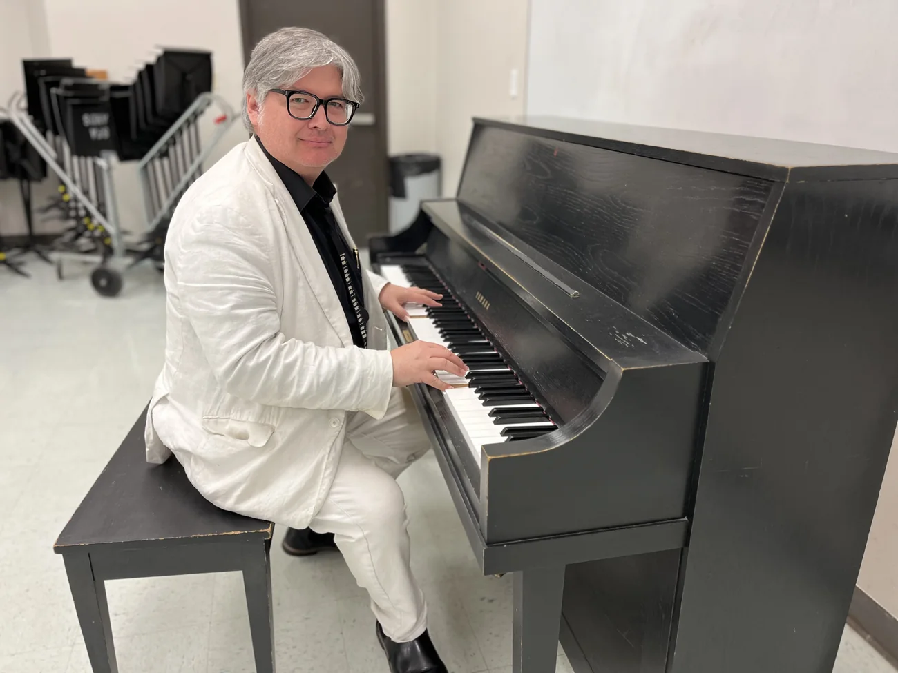 Herbert Midgley playing piano